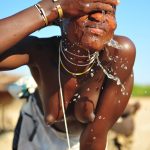 Candid African Tribal Woman Topless Washing