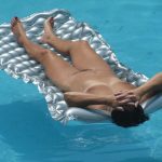 Exposed Wife Naked Floating in the Pool