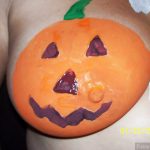 Painted jack-o’-lan·tern on Real Breast