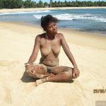 Sandy African Young Nudist Woman