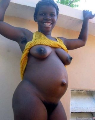 Pregnant Black African Woman Undressing