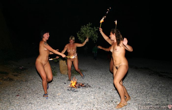 Group-of-Nudist-Women-Dancing-Naked-at-Campfire-HD
