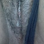 Flashing black outer labia close-up