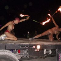 naked-acrobatic-female-strippers-with-fire